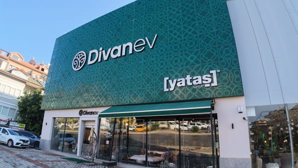 The turquoise patterned facade of the Divanev store